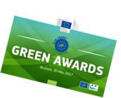 Ein weißer Schriftzug "Green Awards" auf grünem Hintergrund